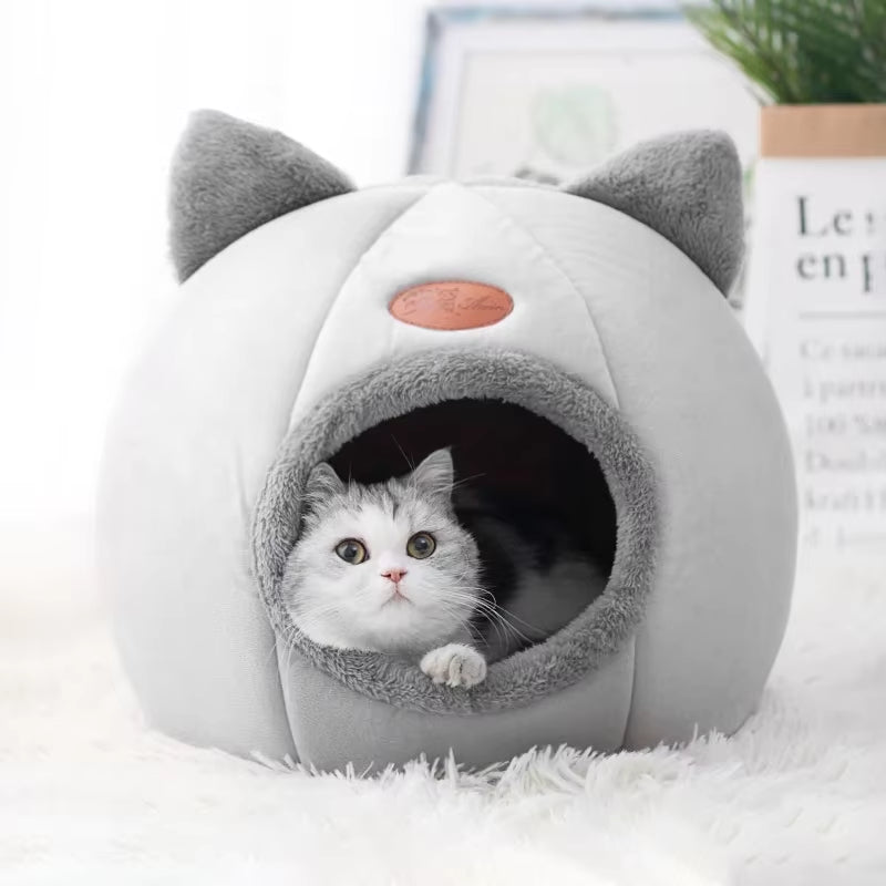 VELDR Cozy Cave Bed shown from the front, plush light grey exterior